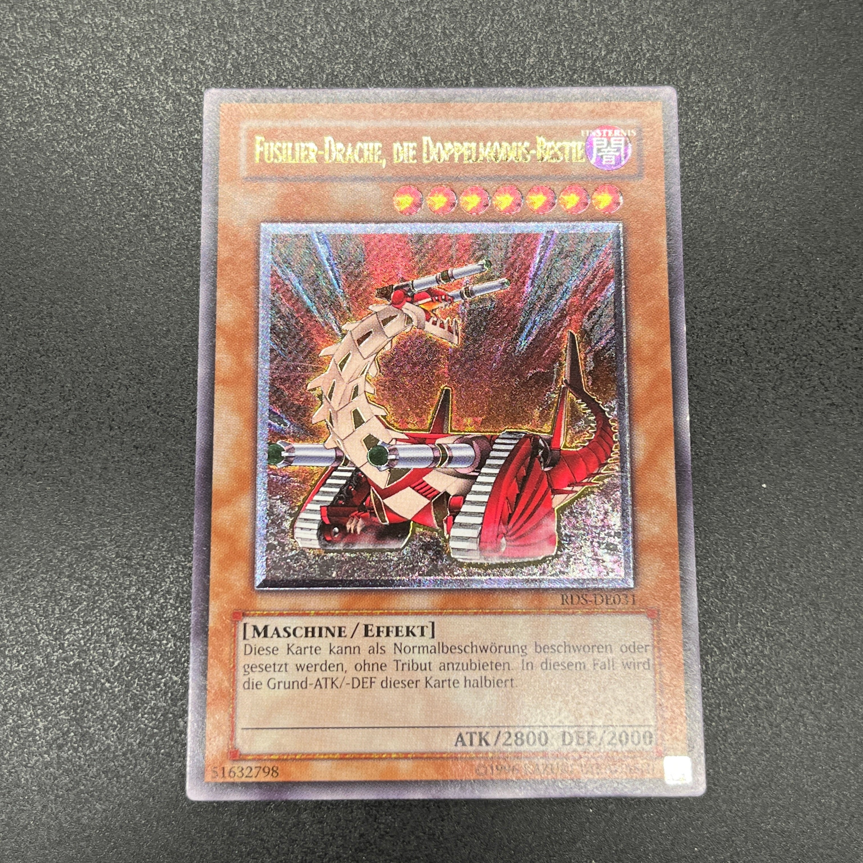 遊戯王 可変機獣 ガンナードラゴン/レリーフ/ドイツ語/EU版 – カード