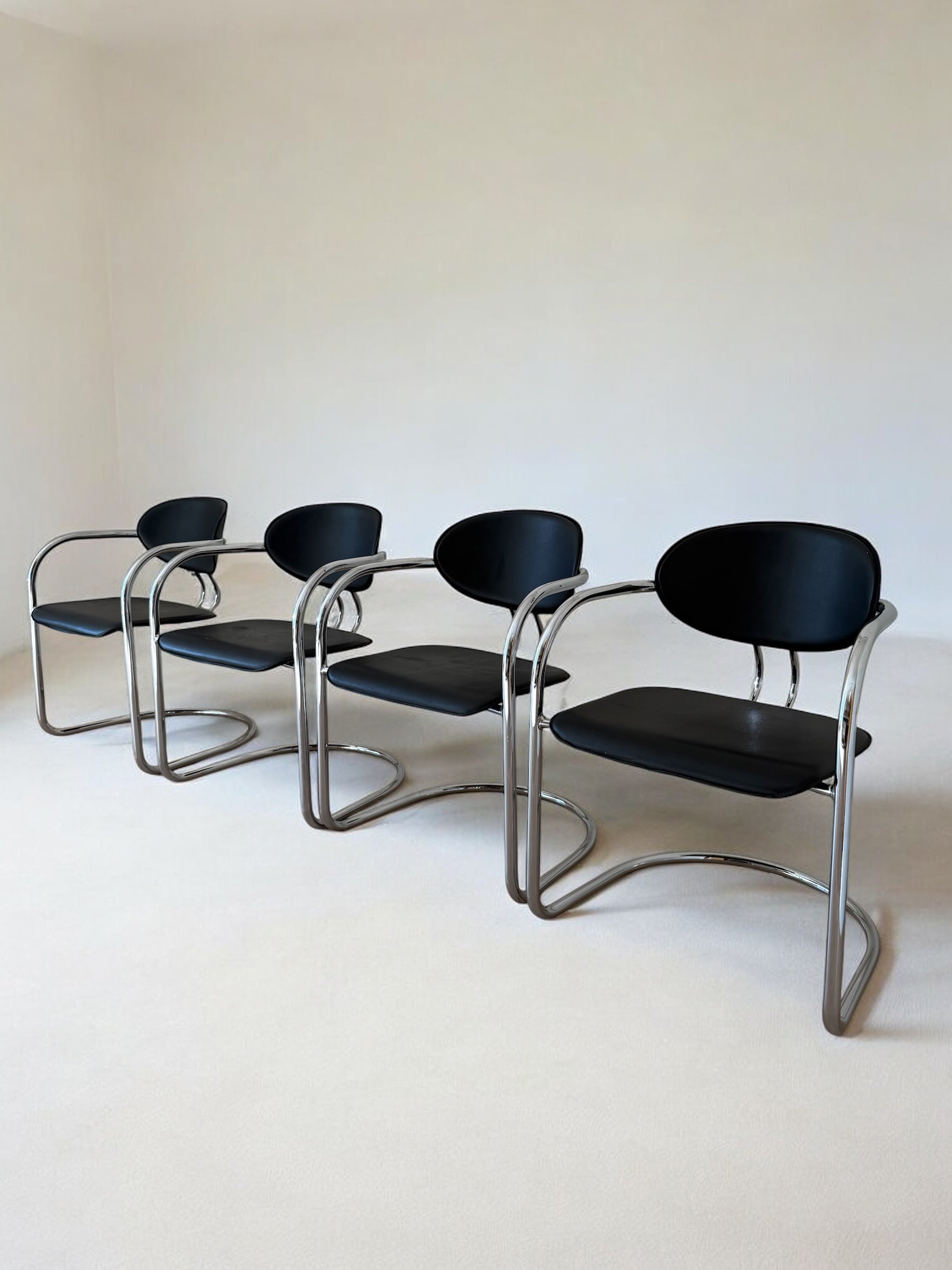 VINTAGE 80S ITALIAN SLIDING CHAIRS BY EFFEZETA (CHROME/BLACK