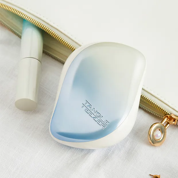 コンパクトスタイラー シルキーブルー | 絡まない魔法のヘアブラシ