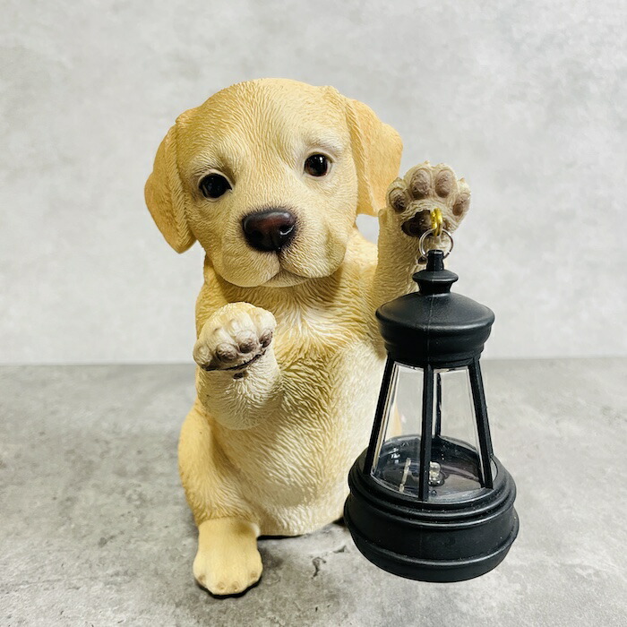 楽天市場】かわいい 犬 置物 ソーラーランプを左手で持ち上げる