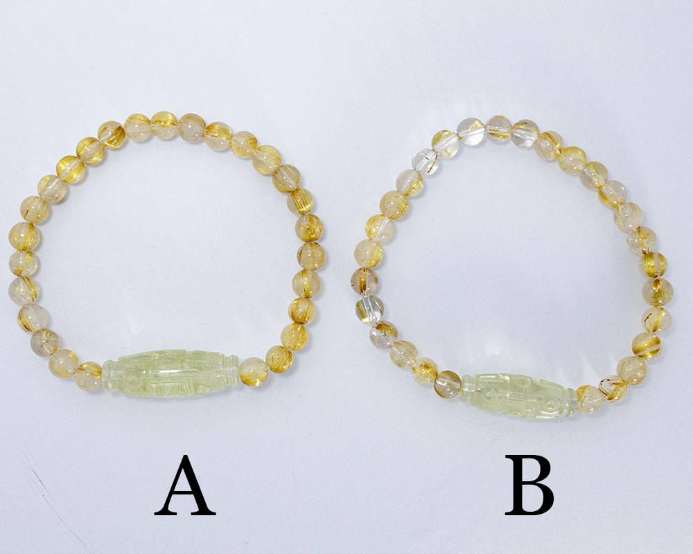 楽天市場】リビアングラス 九眼天珠 ゴールデンルチルクォーツ