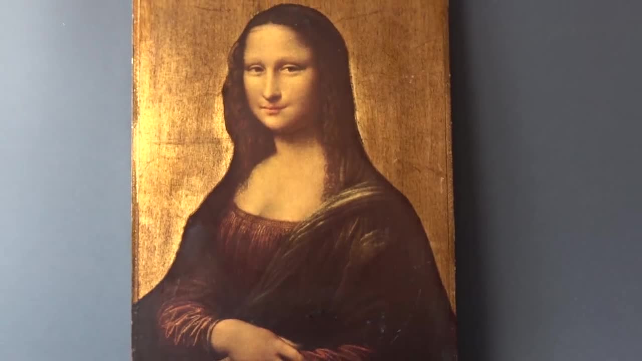 木と金箔のパネルに描かれたレオナルド・ダ・ヴィンチの「モナ・リザ