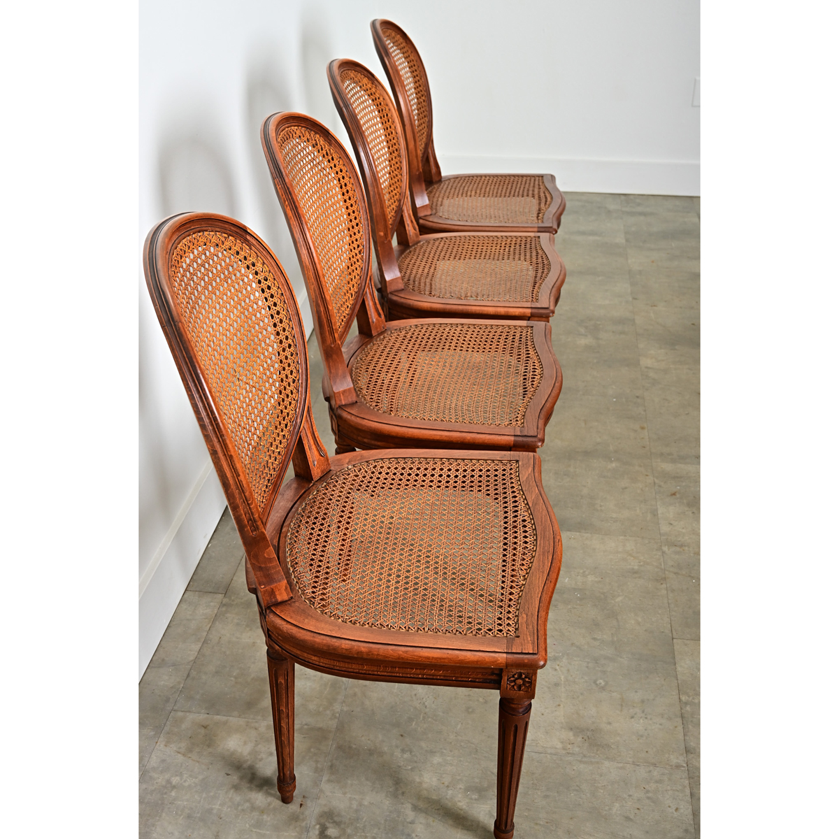 French Set of Four Louis XVI Style Cane Dining Chairs - Fireside