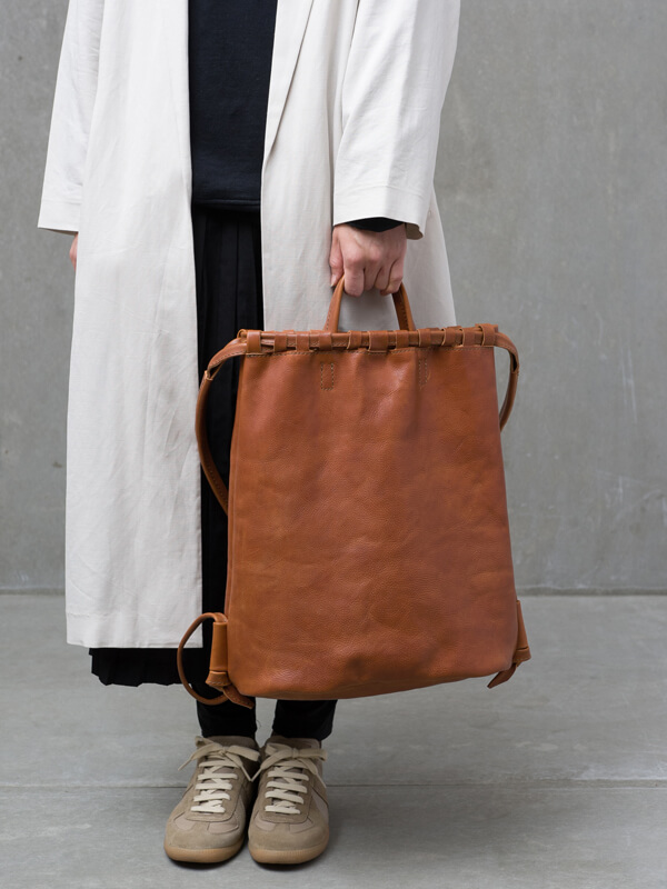 ナップサックをベースにした2wayで使える巾着リュックサック / 革鞄の