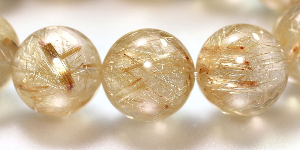 高品質]ゴールドルチルクォーツブレスレット（約17mm大玉！絹のような