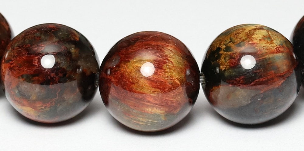 高品質]ピーターサイトブレスレット（約13mm玉・ゴールデン＆レッド