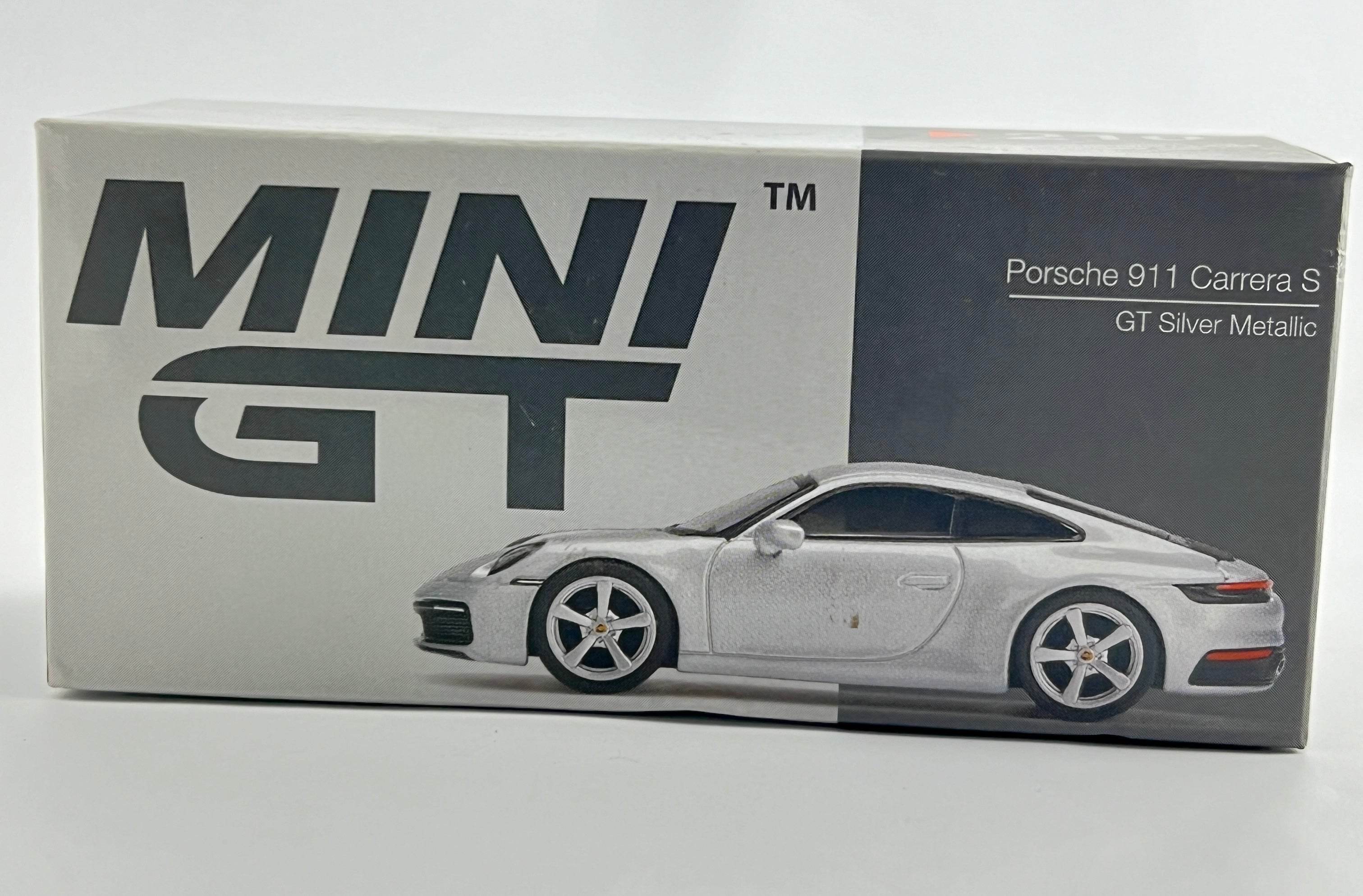 MINI GT - PORSCHE 911 CARRERA S -GT SILVER METALLIC -SEAL OPENED