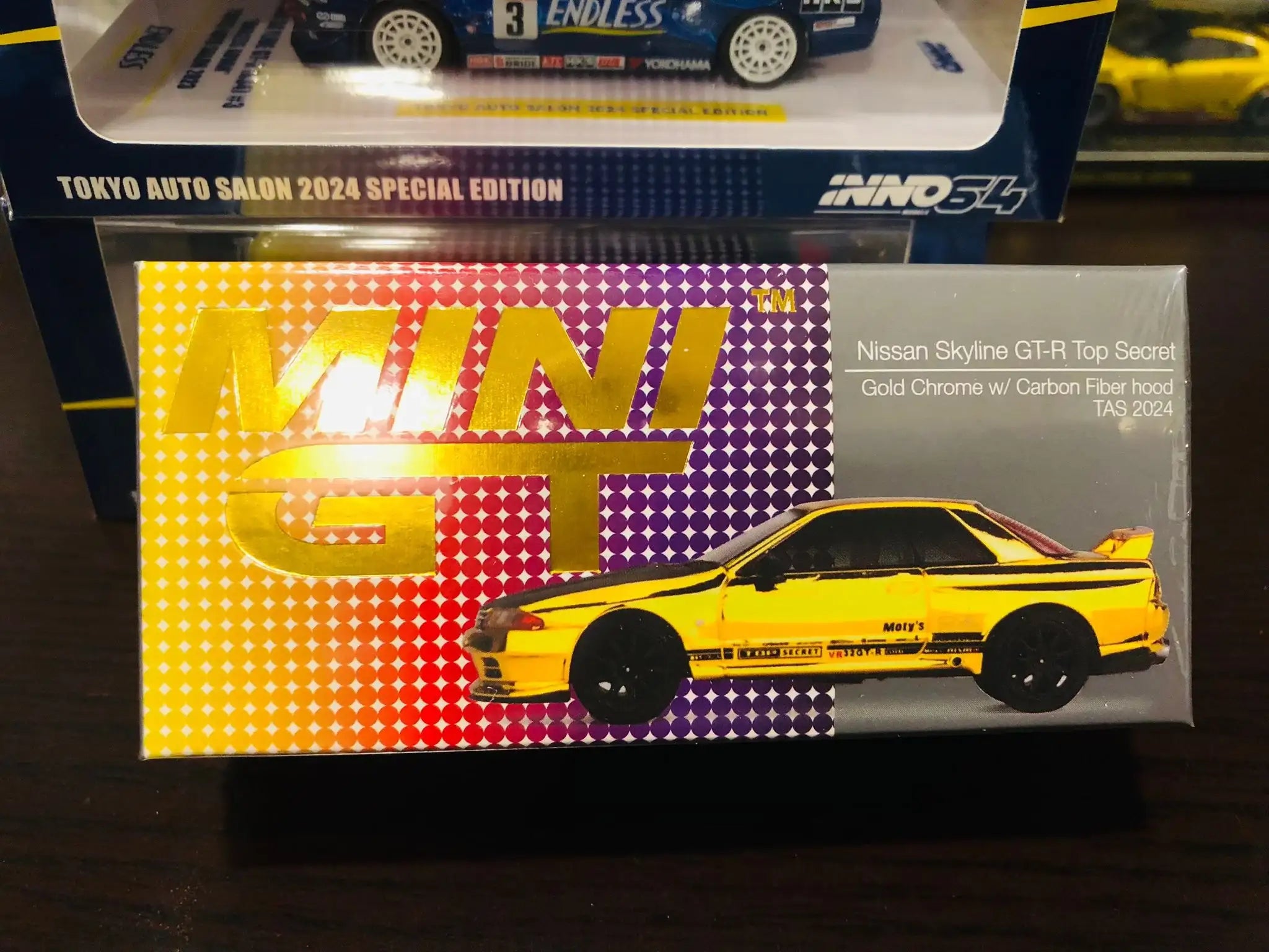 Mini GT #671 Top Secret Nissan Skyline GT-R VR32 Gold Chrome w