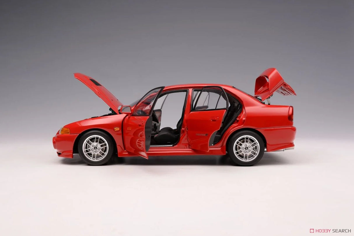 MotorHelix 1:18 Mitsubishi Lancer Evolution IV in Palma Red