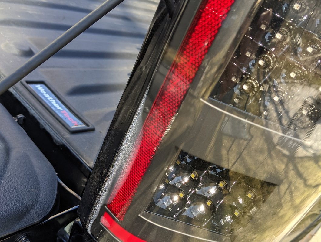 Raxiom LED Tail Lights with Sequential Turn Signals; Black Housing; Cl