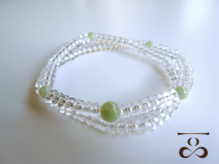 一品(ひとしな)】108ブレス「水晶×ビルマ翡翠」 お数珠の安田念珠店へ