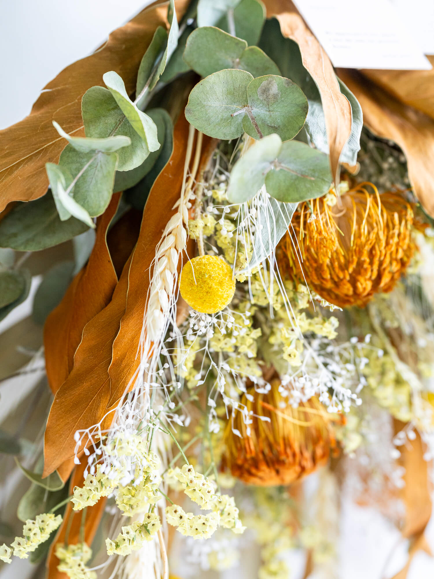 壁に掛ける】ドライフラワーのスワッグ - イエロー - | お花の通販AND