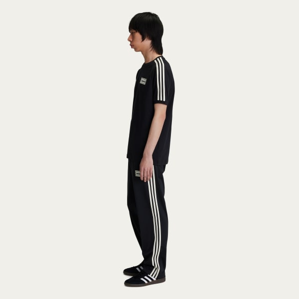 adidas Originals × Oasis ツアースリーストライプス Tシャツ