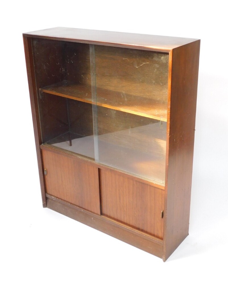 A Herbert E Gibbs autographed vintage 1970's teak bookcase, with