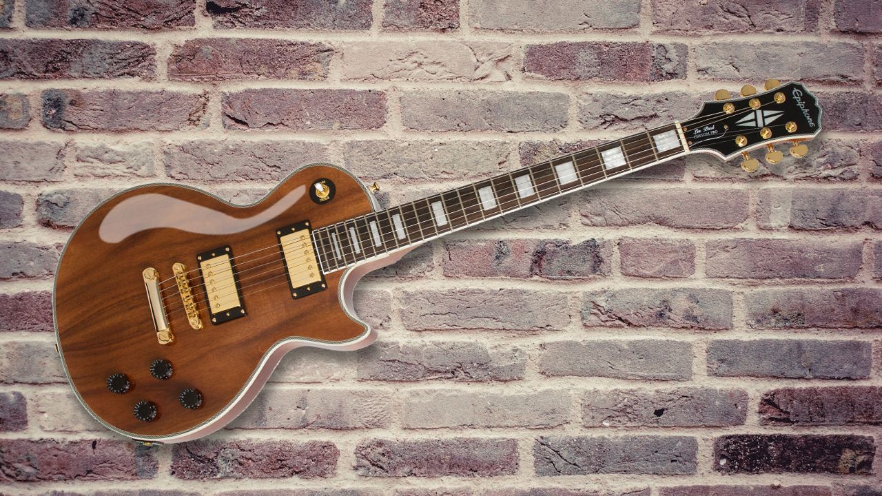 Turns heads with the Epiphone Les Paul Custom Pro Koa electric