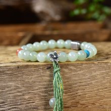 5%OFF】天然マンモスの牙彫刻【静思観音菩薩】ペンダント 厳選された最