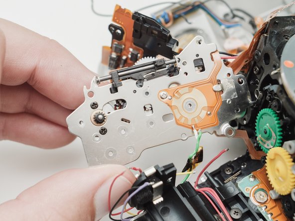 Pentax ZX-5n Mirror Drive Lever Replacement - iFixit Repair Guide