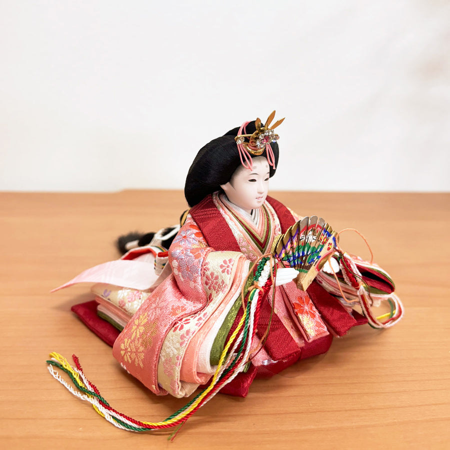 A miniature, retractable doll with a lovely face [Komachi