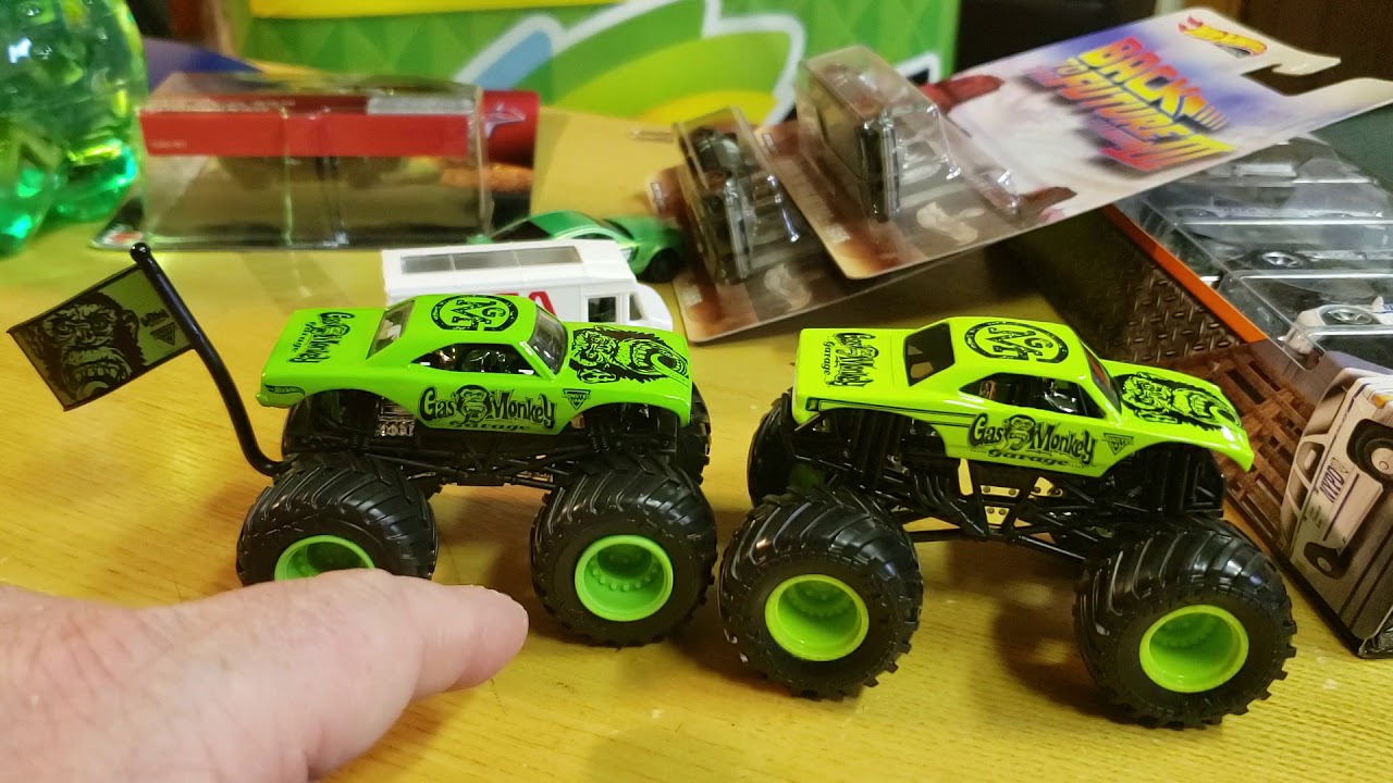Hot Wheels versus spin master monster jam gas monkey garage
