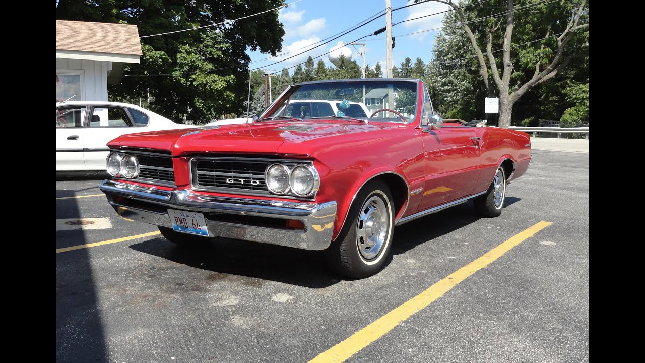 1964 Pontiac GTO Convertible with a Pontiac 421 engine in Red