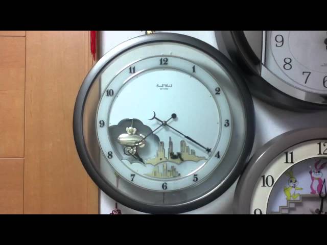 スモールワールド ホバー からくり時計 - YouTube
