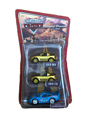 Disney Pixar World Of Cars Gold & Tia Bling McQueen Dinoco Dream