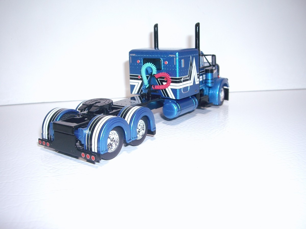 DCP FIRST GEAR 1/64 BLUE WITH STRIPES PETER 379 WITH 63