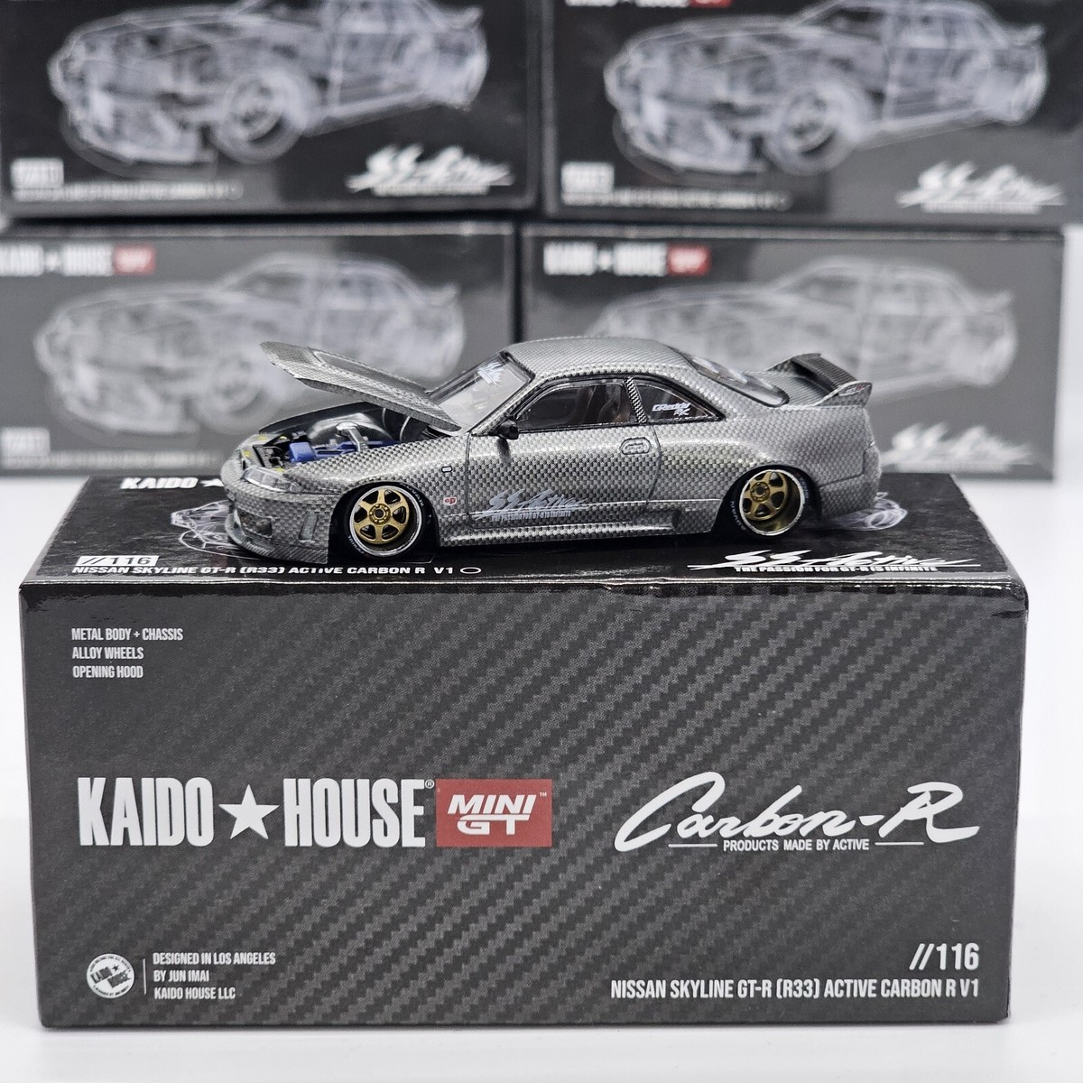 KAIDO HOUSE MINI GT NISSAN GT-R (R33) ACTIVE CARBON R KHMG116 1/64
