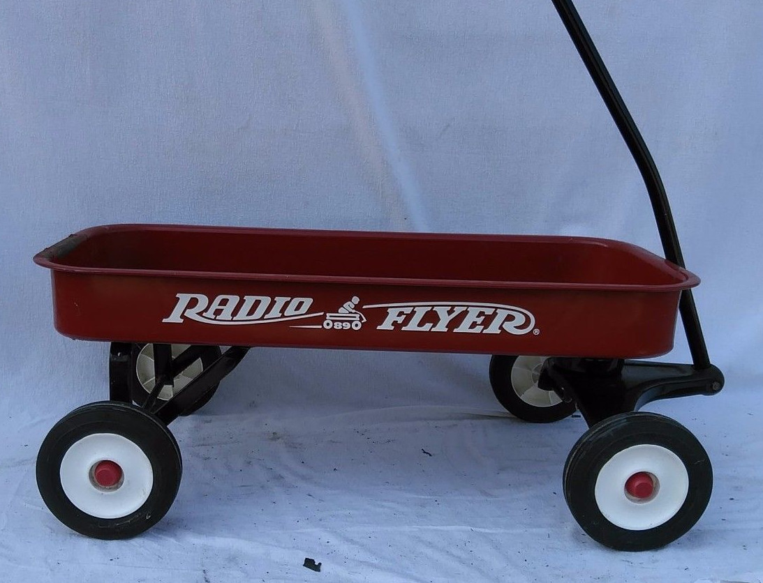 Vintage Radio Flyer Children's Pull Ride on Red Wagon needs some
