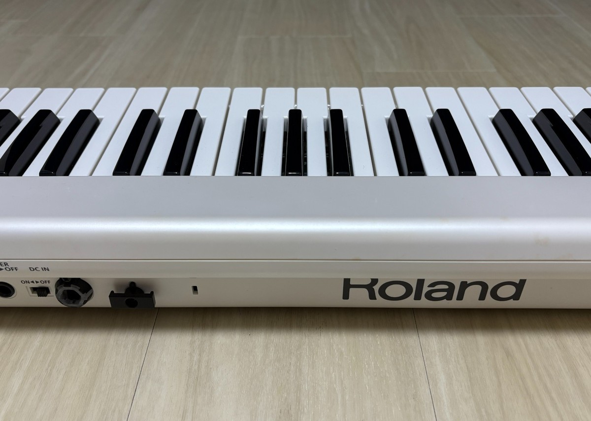 Roland AX-09 Lucina 37-Key Keytar Shoulder Keyboard Synthesizer