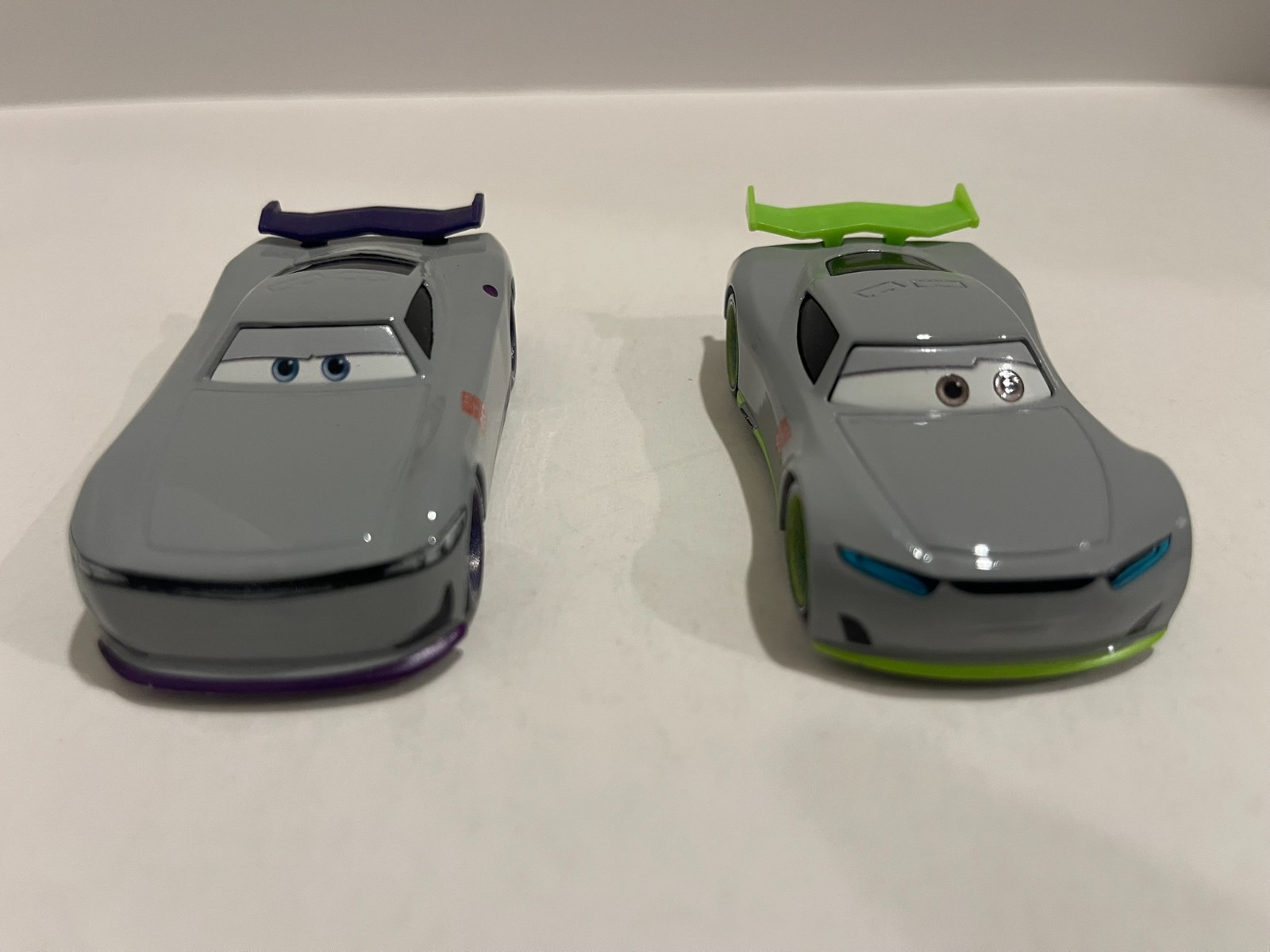 Disney Pixar Cars Next-Gen Ronald #035 & Junyi #057 trainee racers