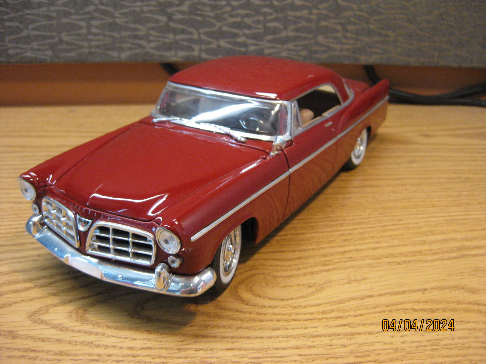 1/18 1956 CHRYSLER 300 B, IN DARK RE OR MAROON , BY MAISTO, NO BOX