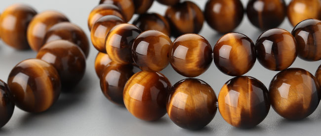 天然石　仏陀　タイガーアイ　860g 楽天市場】【お守り タイガーアイ】金運や仕事運をUPさせてくれる石