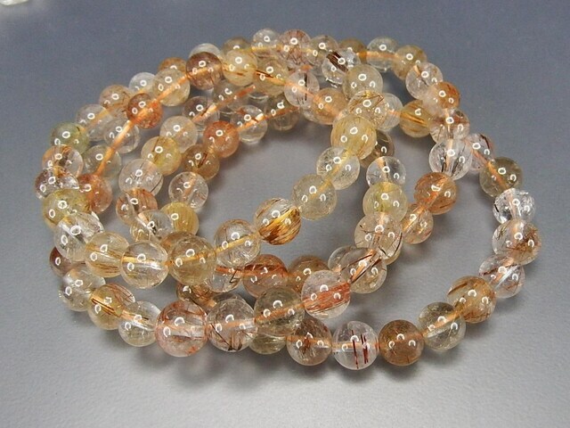 銅針入りルチルクォーツ ブレスレット約7mm強天然石金運健康運 - 【石