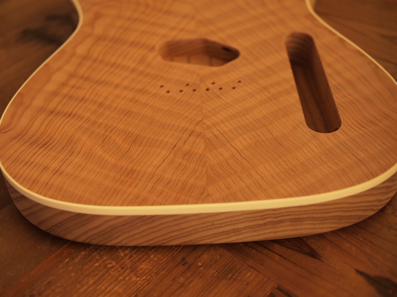 WARMOTH Unfinished Top Bound Telecaster Body - 3A Figured Red Wood