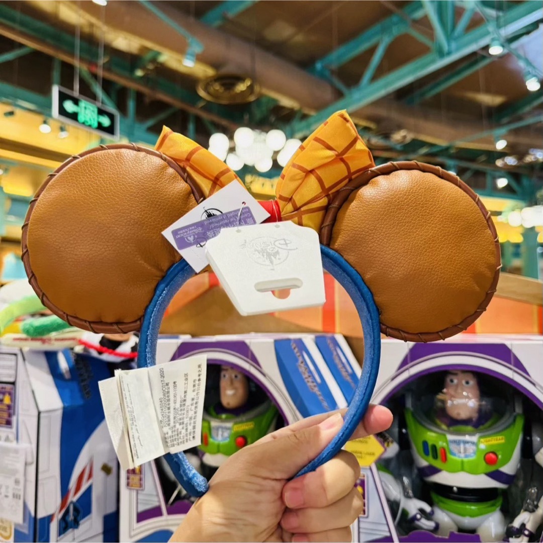 上海ディズニー新作 トイストーリー ウッディカチューシャの通販 by