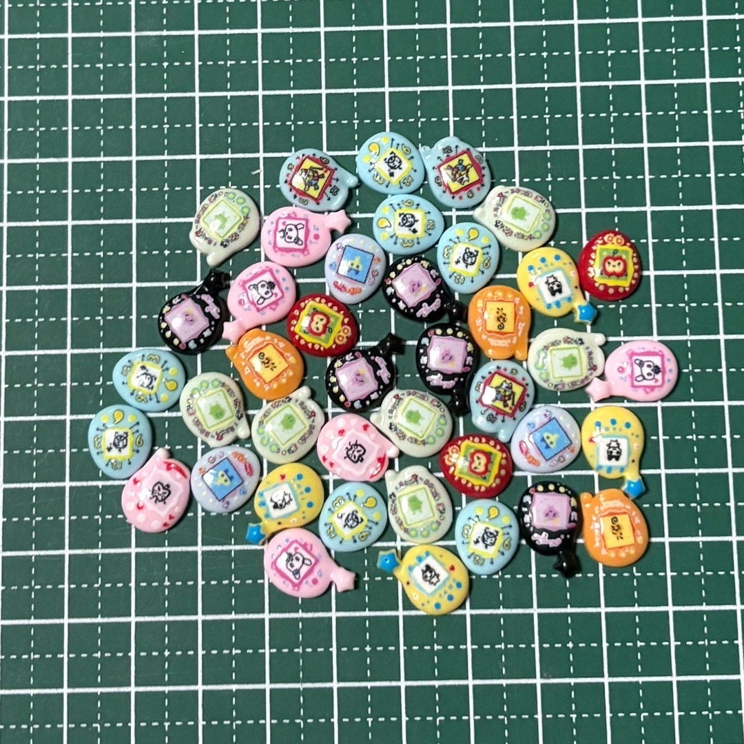 たまごっち 本体型 ネイルパーツ ランダム50個の通販 by picoshop-k