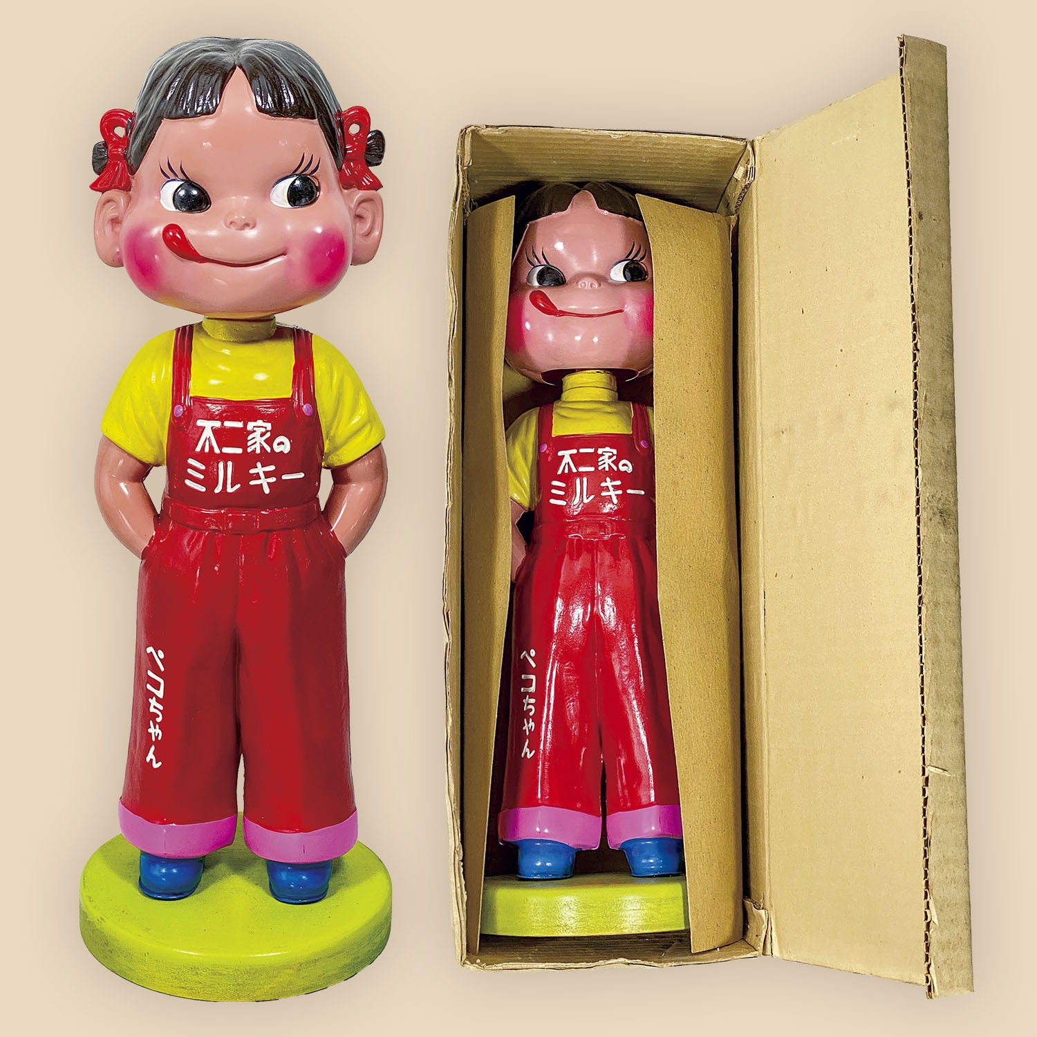 1010］ 不二家 ペコちゃん首振り人形 黄緑台座 箱付