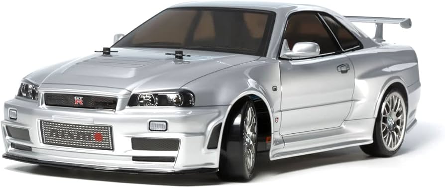 Amazon.com: TAMIYA NISMO R34 GT-R Z-Tune 4 Wheel Drive On Rd TT02D