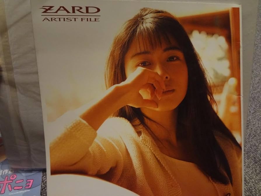 Amazon.co.jp: ZARD 坂井泉水 写真集 ARTIST FILE : おもちゃ