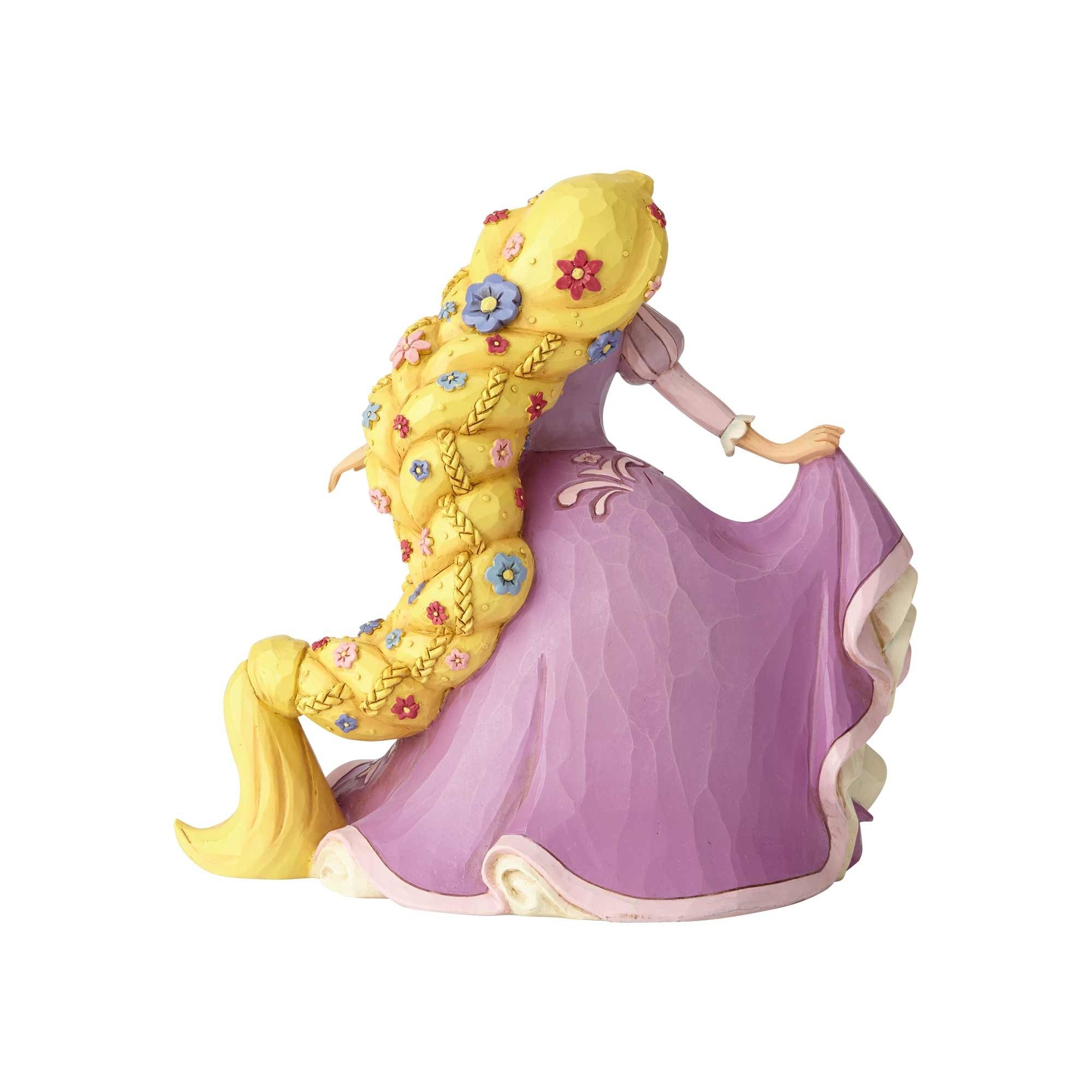 Amazon.com: Enesco Disney Traditions Rapunzel with Pascal Charm