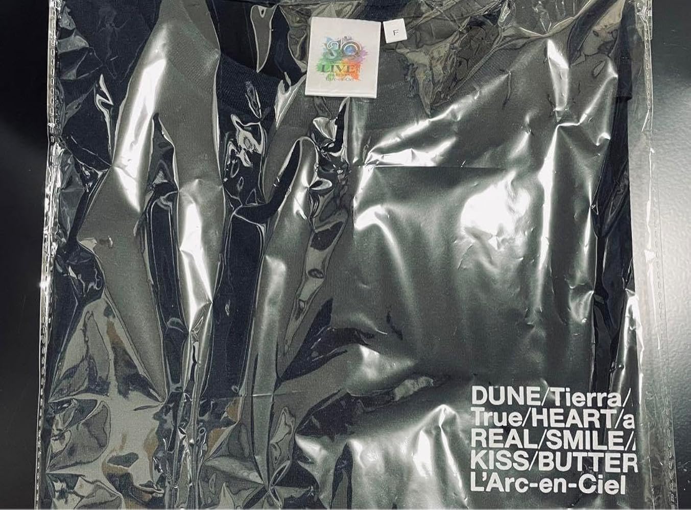 Amazon | L'Arc-en-Ciel 限定 BIG 旧ロゴ Tシャツ 黒 ラルクアンシエル