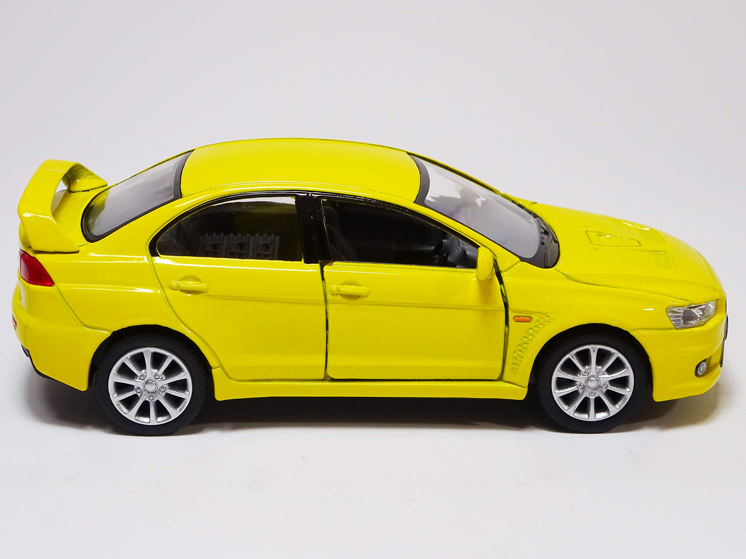 Amazon | キンスマート 三菱 ランサーエボリューション X イエロー 1