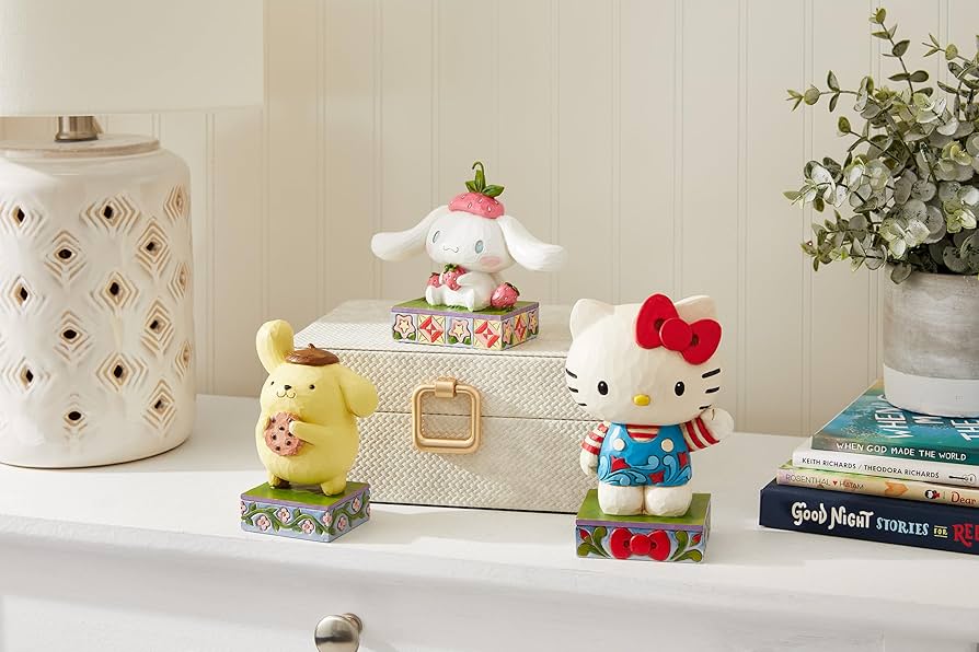 Amazon.com: Enesco Sanrio by Jim Shore Pompompurin with Cookie