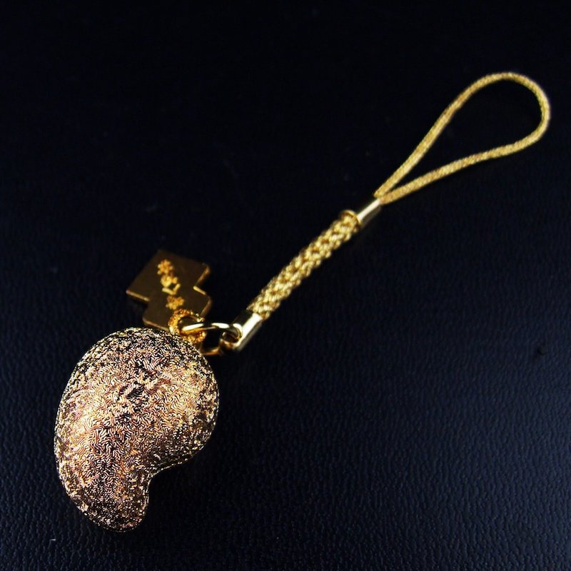 幸運を呼ぶ鈴 勾玉水琴窟の音まもり 金色（ちぢみ）｜白崎八幡宮