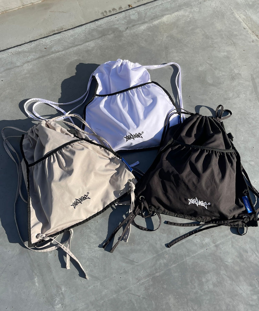 SEQUENZ 2 FACE STRING KNAPSACK / リバーシブル テック ナップサック