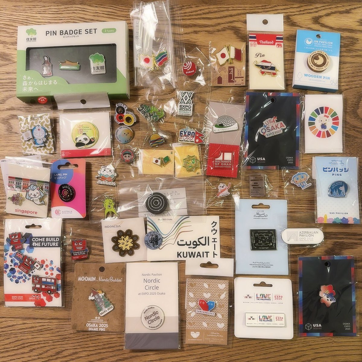 ✨2025.7.26現在✨ 万博のパビリオンでgetしたピンバッジ達🧡 ここへき
