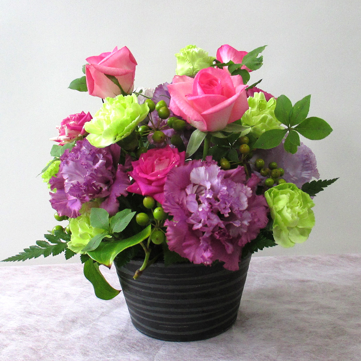 アレンジメント[ピンク/紫] - 株式会社沢田花房