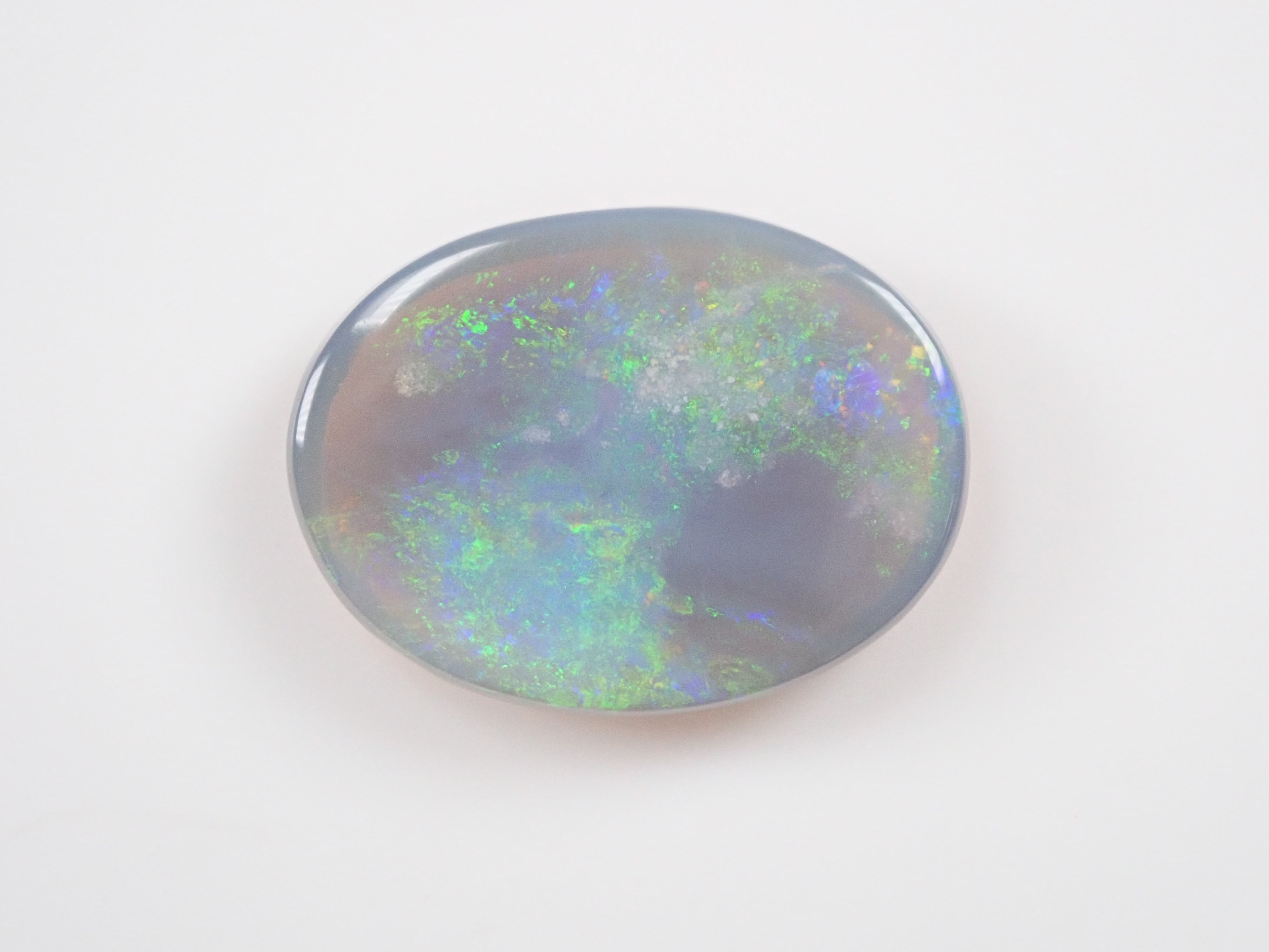 オーストラリア産ブラックオパール 6.560ctルース 鑑別書