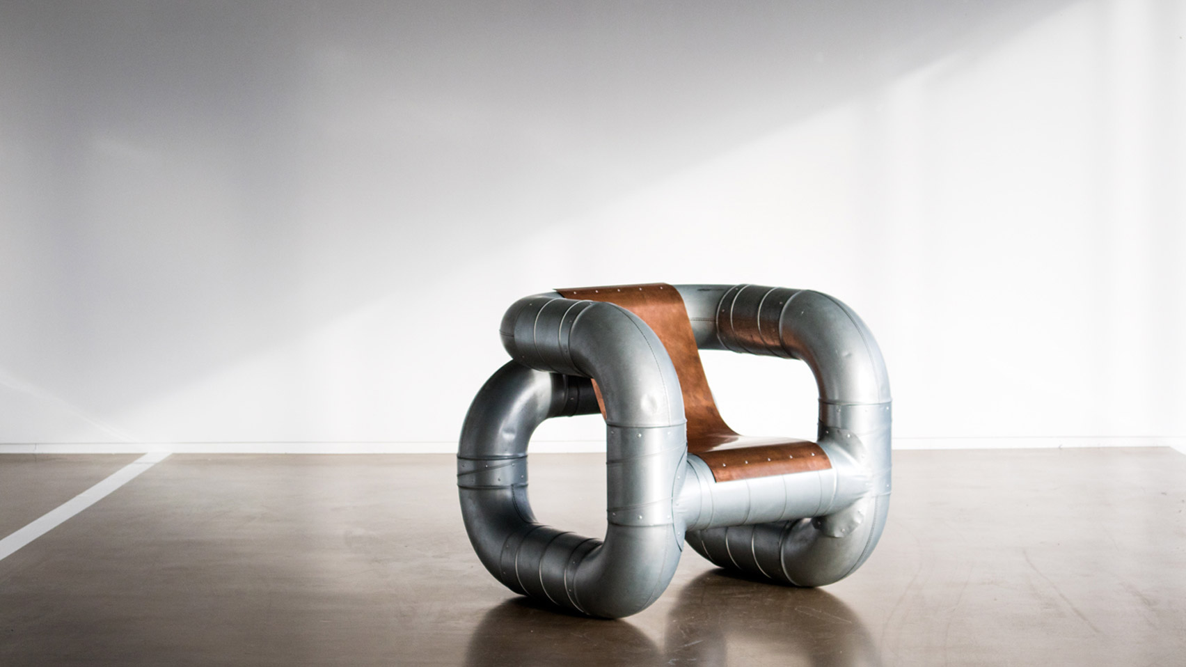 Lucas Muñoz creates furniture from ventilation pipes and scrap metal